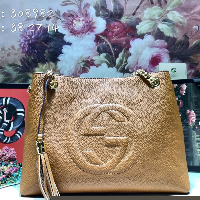 G*u*i shopping bags